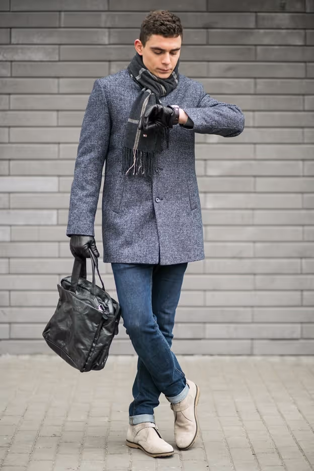 Custom-made overcoats are tailored to your specific body measurements, ensuring a perfect fit that complements your body shape and posture. Off-the-rack overcoats, on the other hand, are designed to fit a more generic range of body types, which may not always be ideal for everyone.
