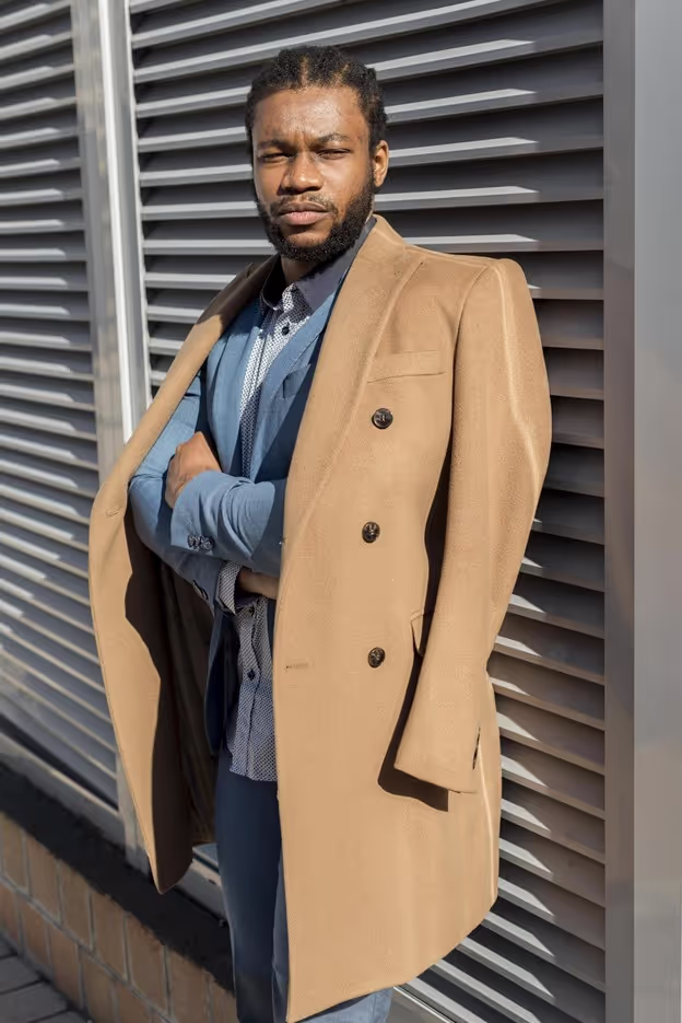 Double-breasted suits and jackets are timeless and sophisticated, but recent trends have given them a modern twist. Here’s a detailed explanation of the latest styles in plain, striped, and windowpane designs for different occasions and seasons