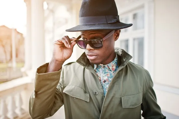 Classic Safari Suit: This is the traditional safari suit, typically made from lightweight khaki cotton or canvas. It features a button-down shirt with epaulettes, patch pockets, and a belted waist. The pants are usually straight-leg or cuffed. Classic safari suits are suitable for a variety of occasions, from casual outings to formal events.