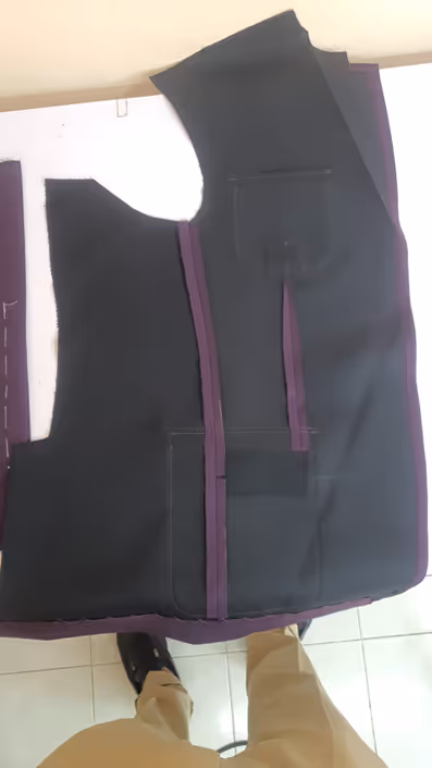 A fused jacket construction shows how the fabric is adhered to the interfacing, typically showing a smooth, flat appearance without much internal detail.