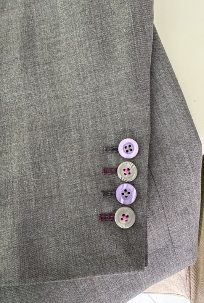 Custom-made suits offer unique features tailored to the client’s exact measurements, style preferences, and functional needs. Some special features often incorporated in custom suits include: