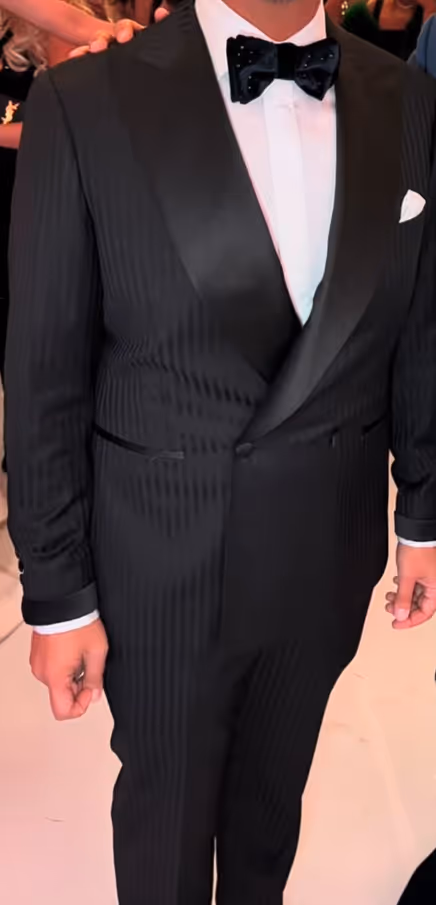 Wide Lapels: Consider slightly wider lapels as they can balance out broader shoulders, providing a more proportionate look.