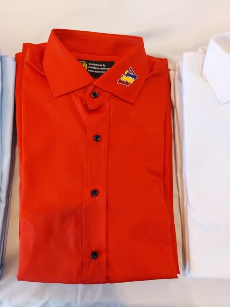 Custom uniforms ensure that all employees represent the company in a consistent manner, promoting unity and a team spirit.